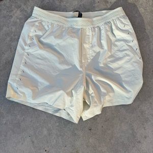 Ten thousand session short, 5”, cream/off white, excellent (never worn)